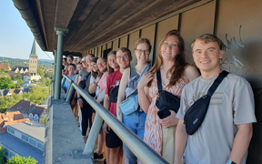 Students pose for photo on balcony in Germany