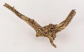 tattooed wood art piece