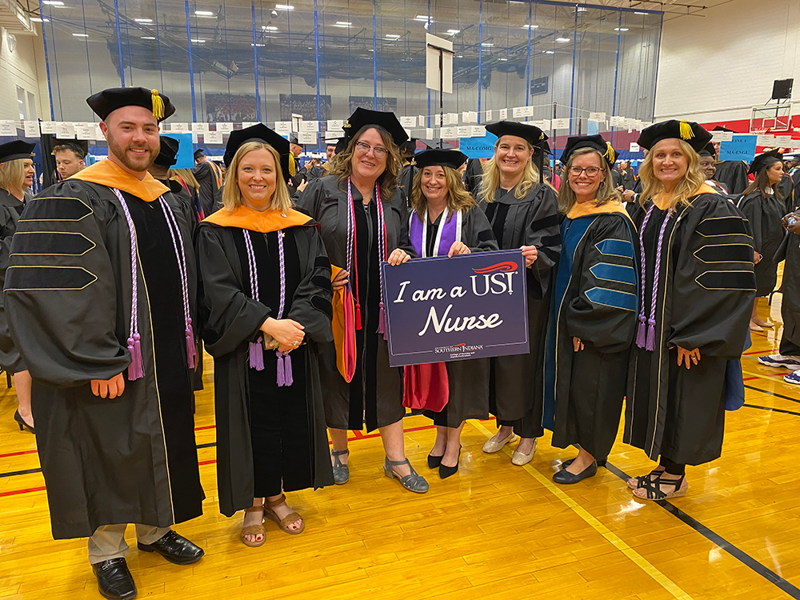 Graduate nursing faculty and students at graduation