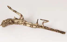 tattooed wood art piece
