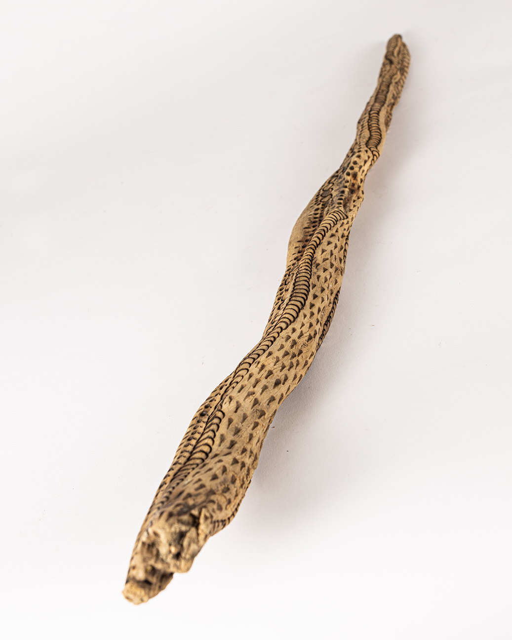 tattooed wood art piece