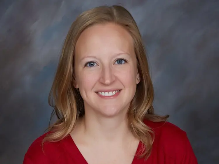 Professional portrait of USI German graduate Carrie Schmitt