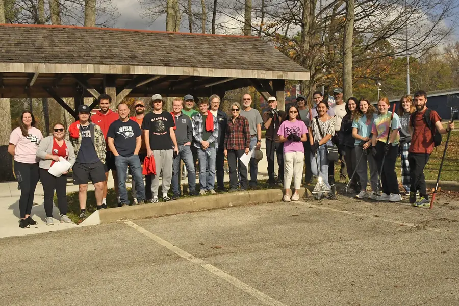 Members of USI's Trail Committee with volunteers at the 1st Trail Clean Up and Weed Wrangle. 