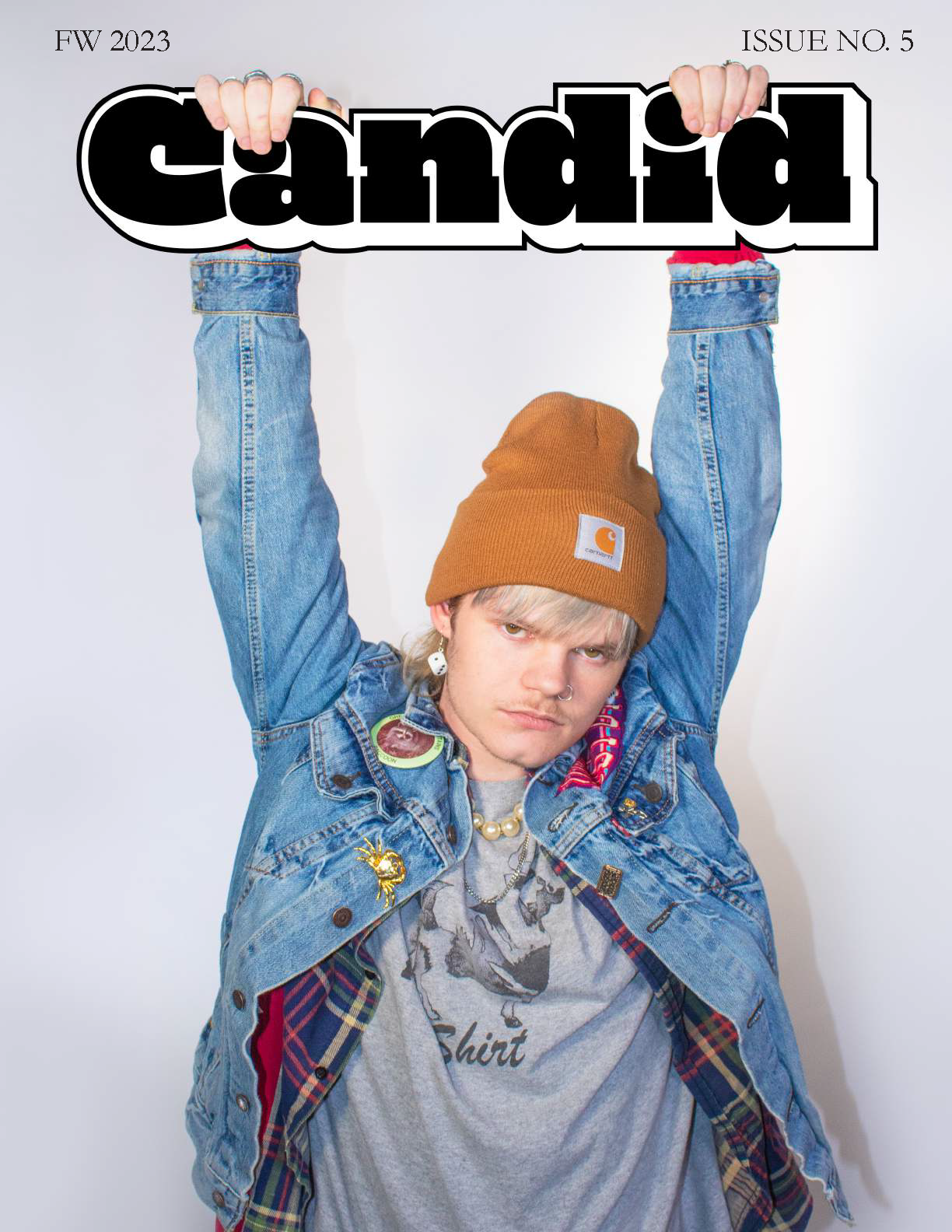 Candid Cover, photo of person with hands hooked over the logo.