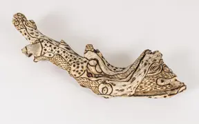 tattooed wood art piece