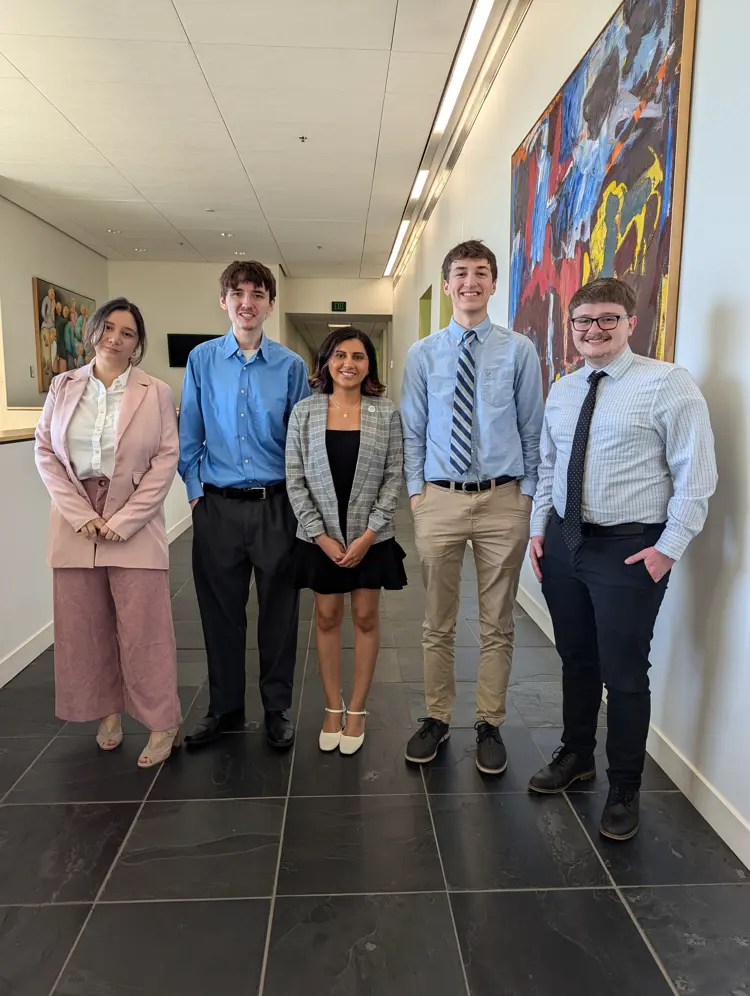 Students who worked with Holmusk pose for a photo