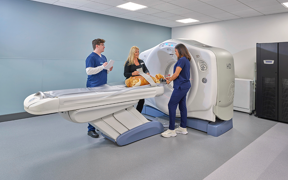 Photo of faculty and students at the CT simulator