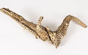 tattooed wood art piece