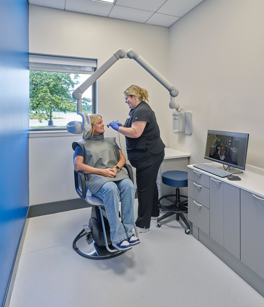 Students taking a radiograph at the dental clinic
