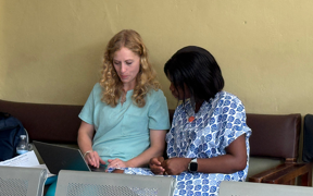 Faculty member interviews a midwife