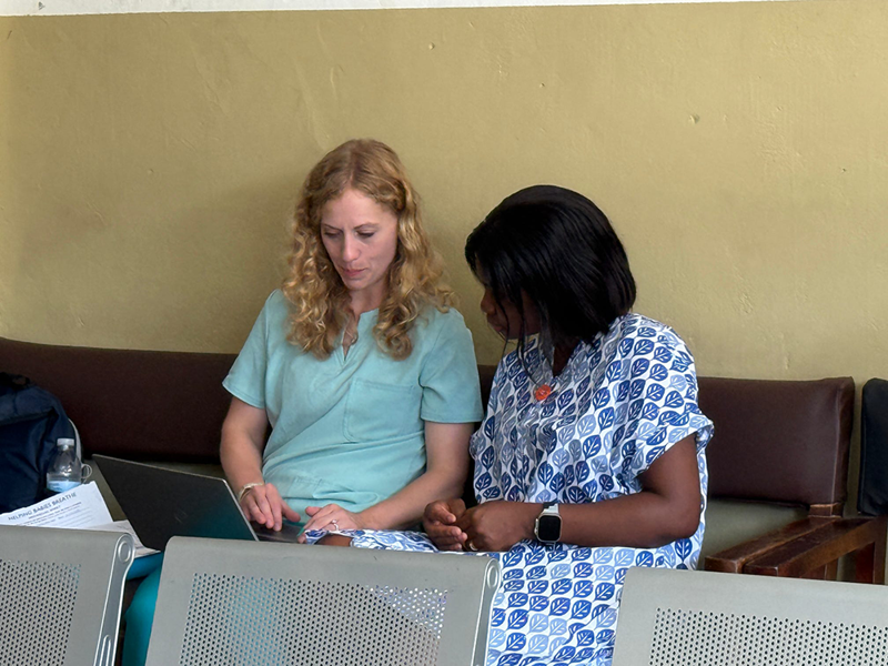 Faculty member interviews a midwife
