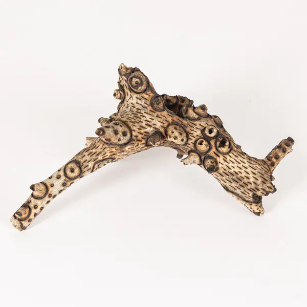 tattooed wood art piece