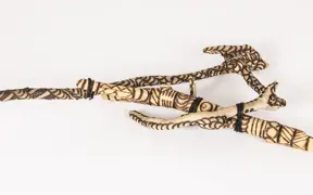 tattooed wood art piece