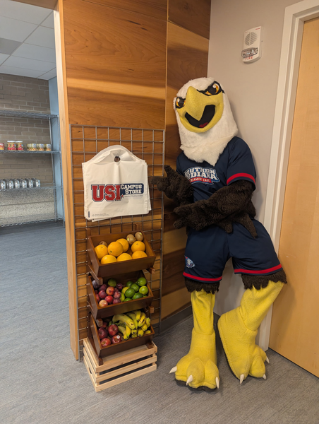 Archie Eagle standing inside the door of food pantry