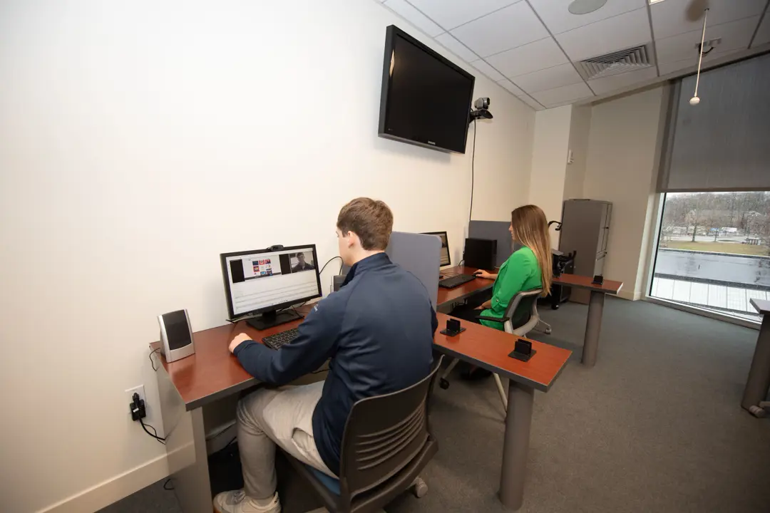 A group of students do research in the Biometrix Discovery Lab
