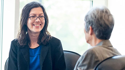 Photo of two ladies talking