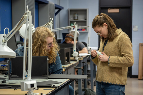 Theatre students working on set designs in the Design Lab.
