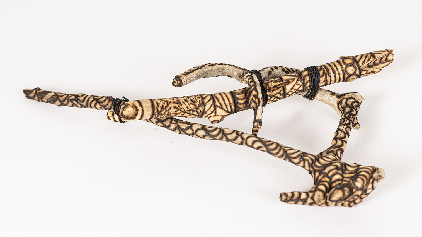 tattooed wood art piece