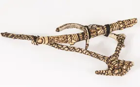 tattooed wood art piece