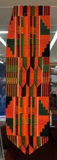 black, orange and green multicolored, geometrically patterned stole