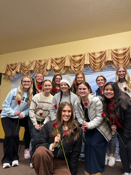 Students participating in roses for residents program