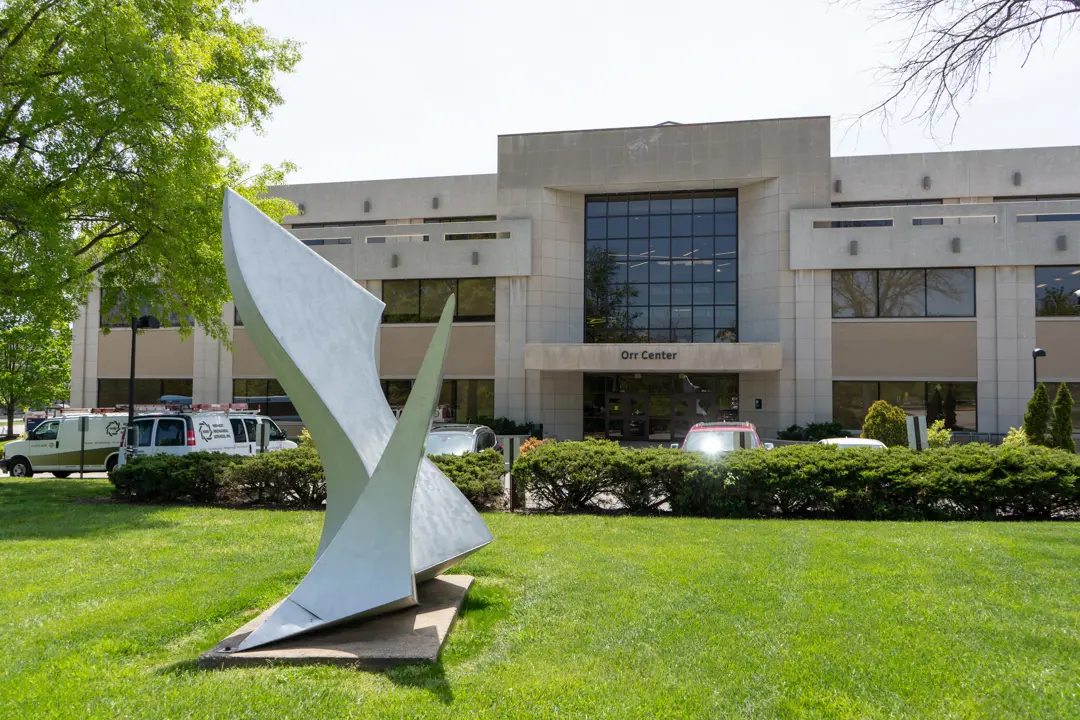 Large abstract sculpture on the lawn in front of the Orr Center building