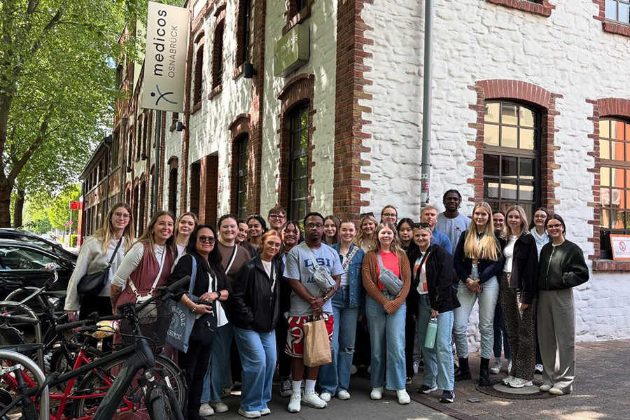 Group of students outside a medical clinic