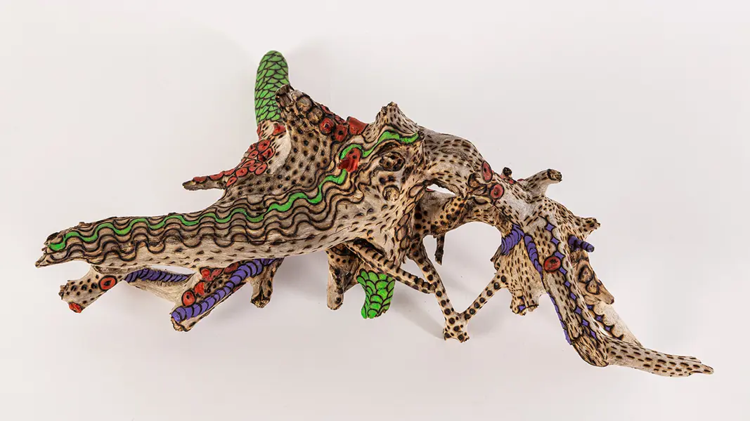 tattooed wood art piece