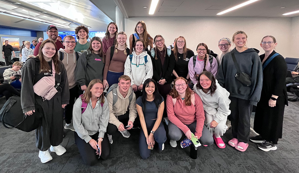 Students at the airport on way to Germany