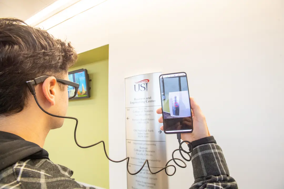 A student uses eye tracking software to look at signs in the Business and Engineering Center