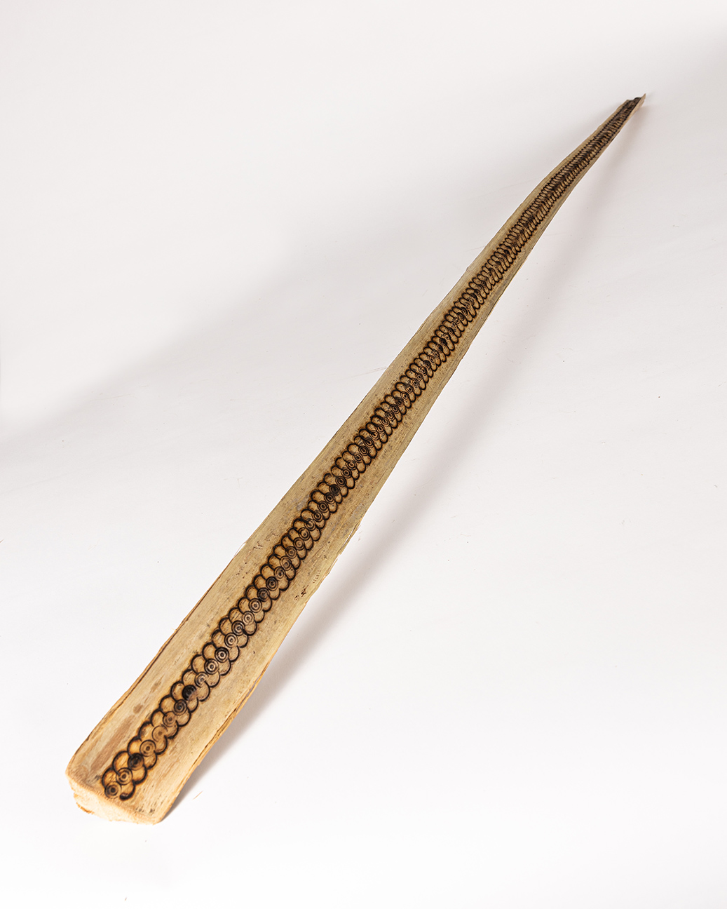 tattooed wood art piece