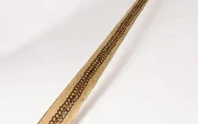 tattooed wood art piece