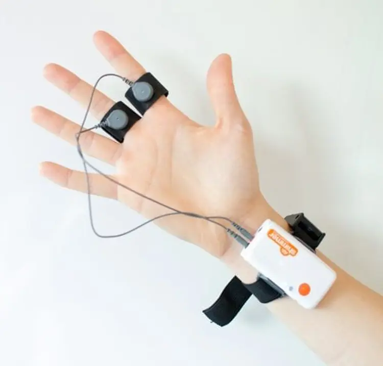 An image of a hand with sensors to detect electrodermal activity