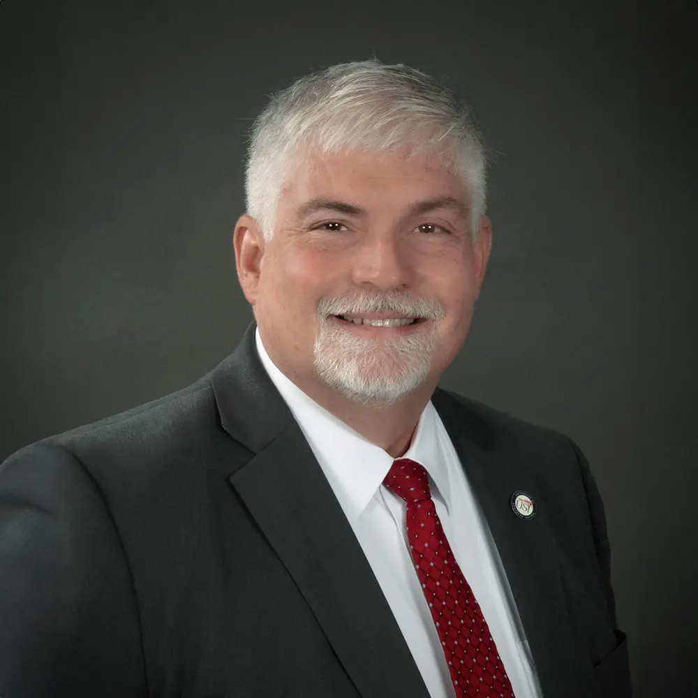 Professional portrait of USI President Steve Bridges