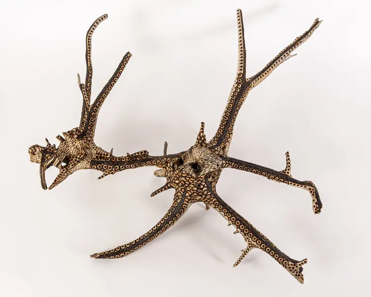 tattooed wood art piece