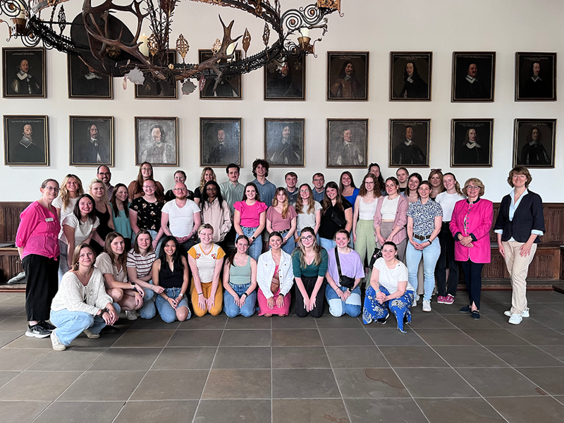 Students pose for photo with mayor in Germany