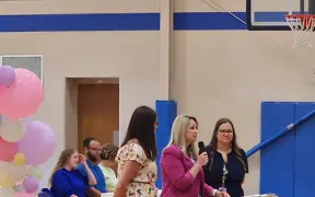 Principal Davis speaking at a school program.