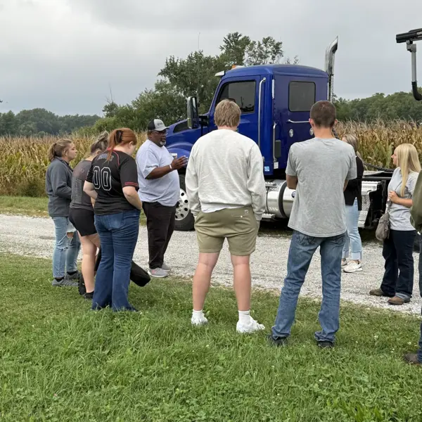 Students learn about commercial trucking and product transportation during a hands-on career exploration activity.