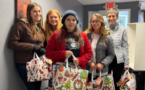 Students with gifts collected for seniors