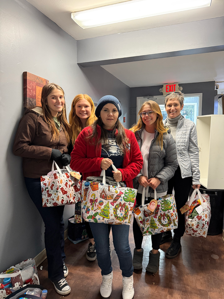 Students with gifts collected for seniors