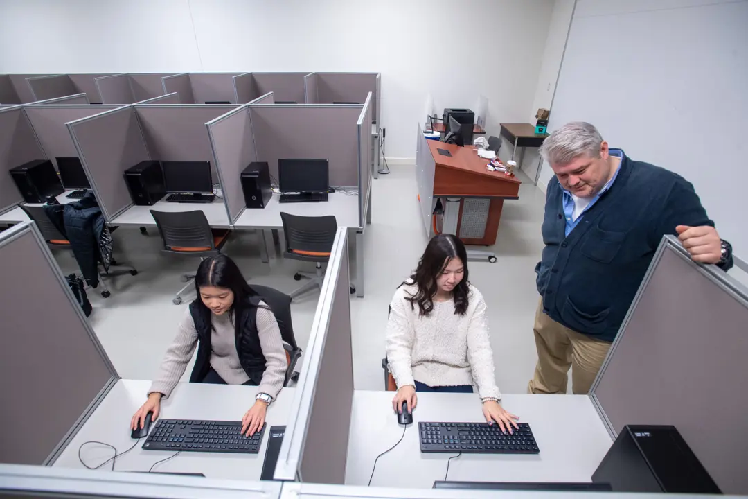 Students participate in research in the Experimental Economics Lab
