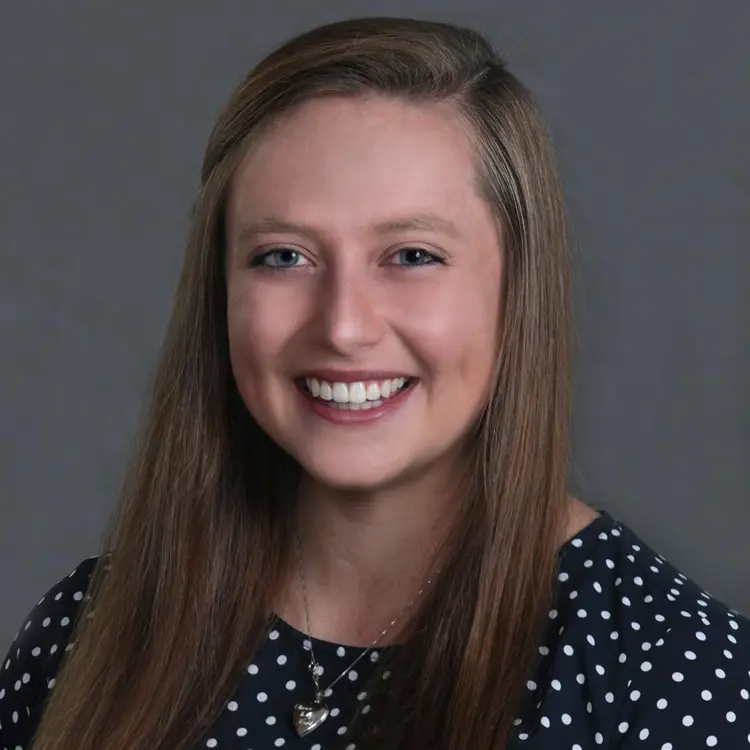 Professional portrait of USI pre-medicine graduate Dr. Lexie Skelton