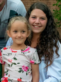 Photo of student with her child