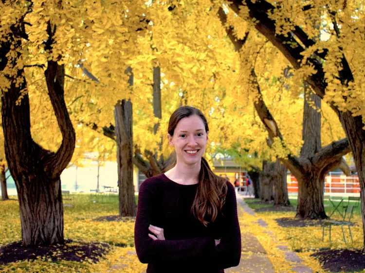 Casual portrait of USI biochemistry graduate Sarah Koester outdoors in the fall