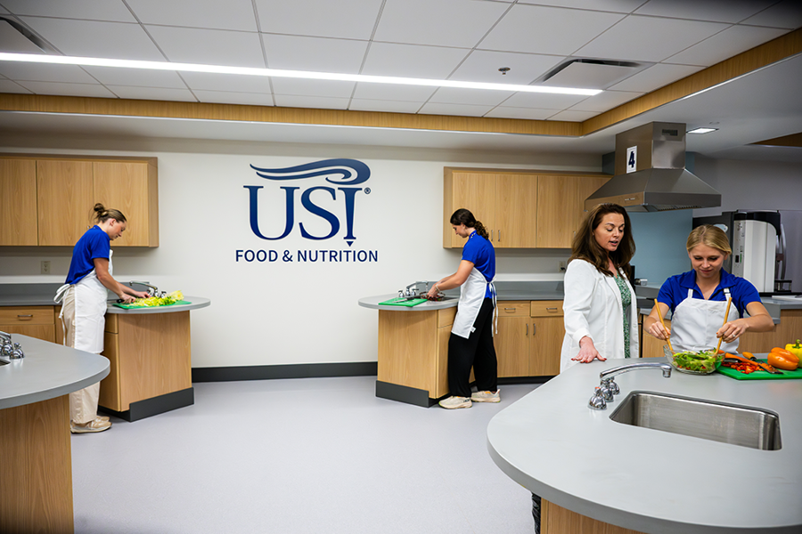 Students using kitchen in lower level of Health Professions Center