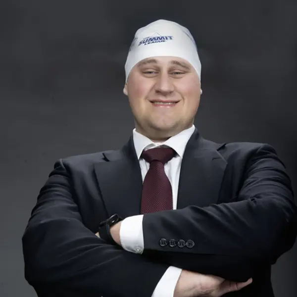 A member of the homecoming court wears one of the swim hats left in the studio for one of his homecoming photos.
