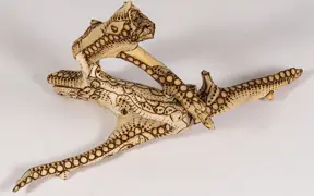 tattooed wood art piece