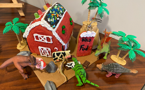 Photo of dinosaur themed gingerbread house