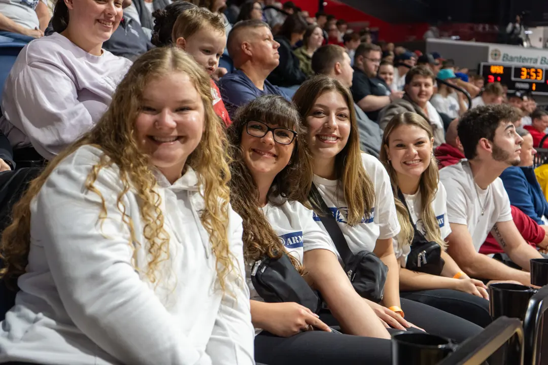 Group of students at an athletic event on Communication and Media Night