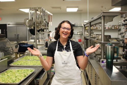 Administrator-in-Training working in nursing home kitchen
